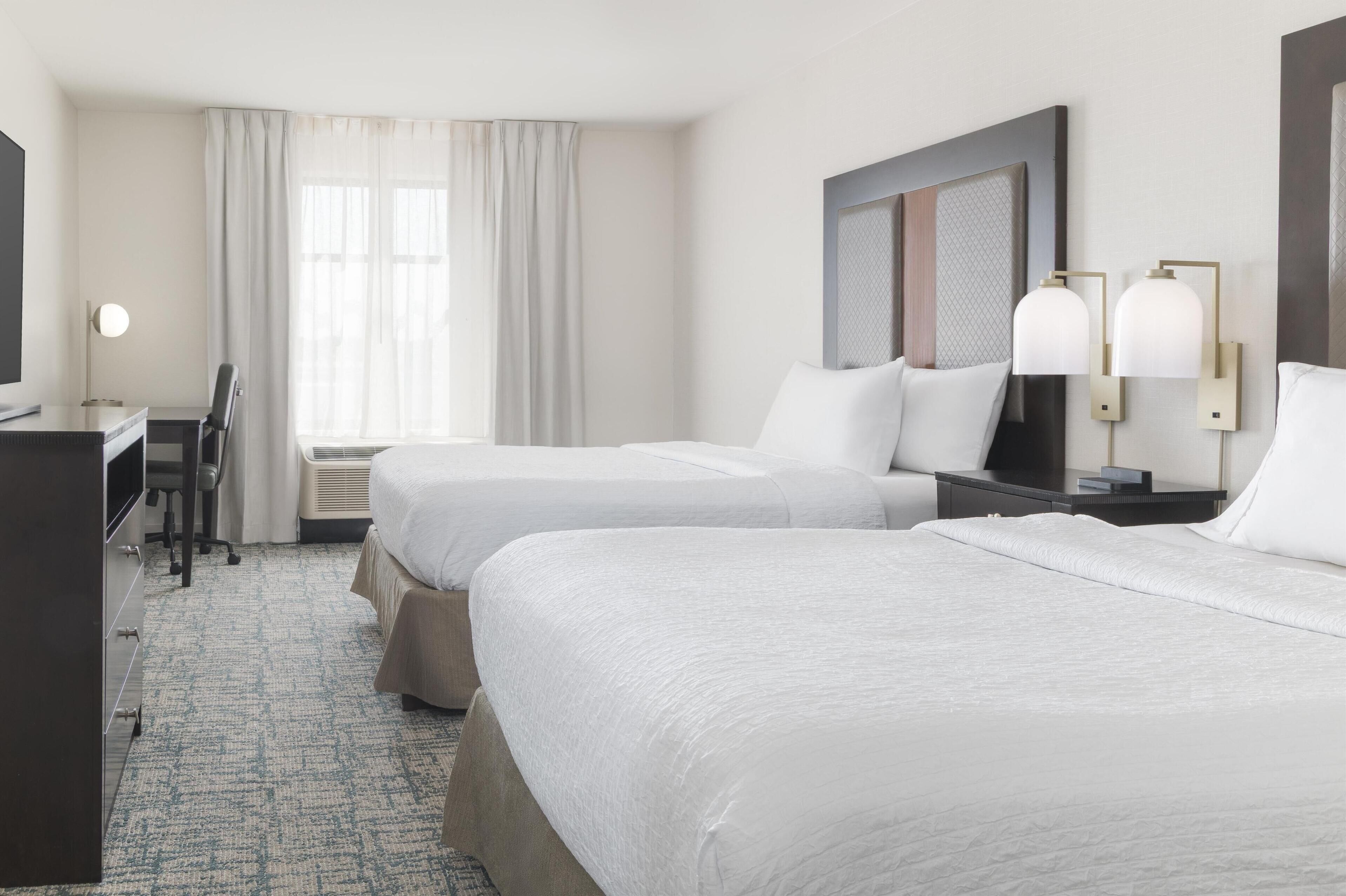 suite, 1 bedroom, non smoking | hypo-allergenic bedding, iron/ironing board, free cots/infant beds