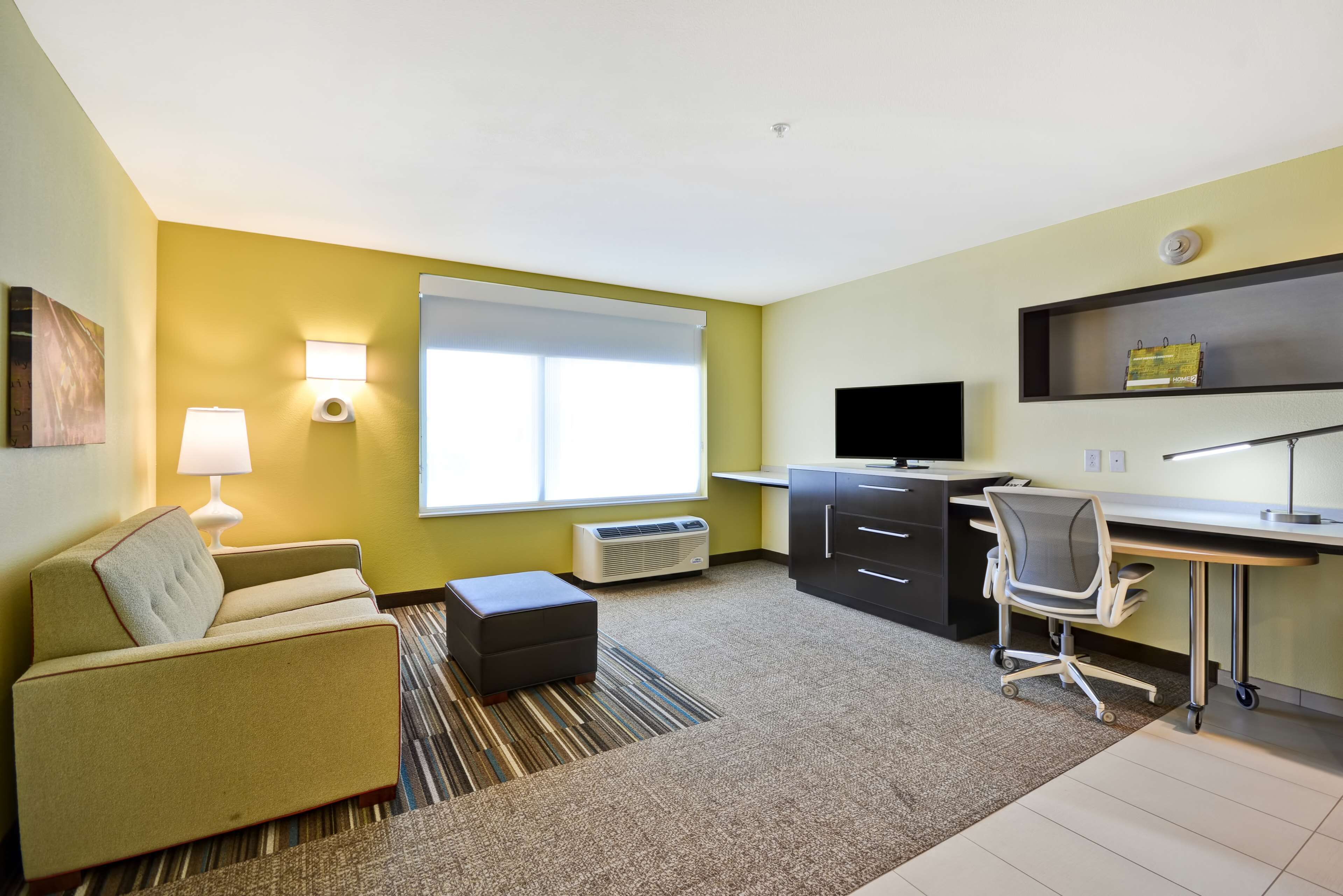 suite, 1 bedroom, non smoking | in-room safe, desk, laptop workspace, blackout curtains