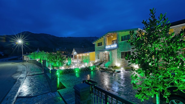 A hotel with a stone facade, a visible entrance, and a sign that reads "GANA GACE". - Casa Gaçe Hotel (Qendër Bulgarec)