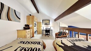 A bedroom with a loft bed, a desk, a chair, and a washing machine. - CLEAN Charmer Walk 2 Ski Lifts - Wi-fi, Views, Pool, Hot Tub , Washer, Fireplace (Park City)