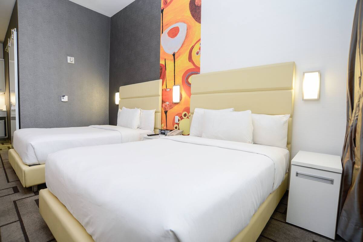Premium bedding, in-room safe, desk, iron/ironing board