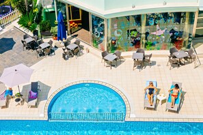 Seasonal outdoor pool, pool umbrellas, pool loungers