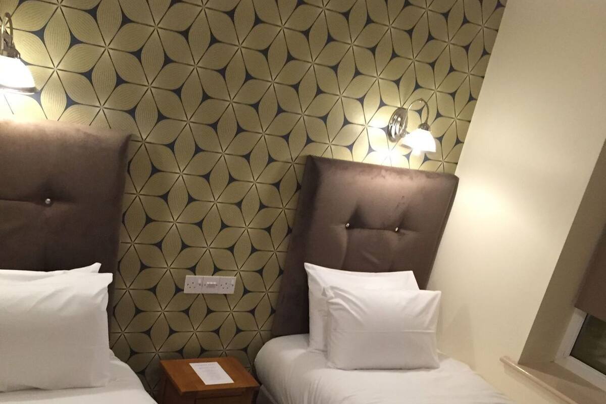 Premium bedding, desk, iron/ironing board (on request), cots/infant beds