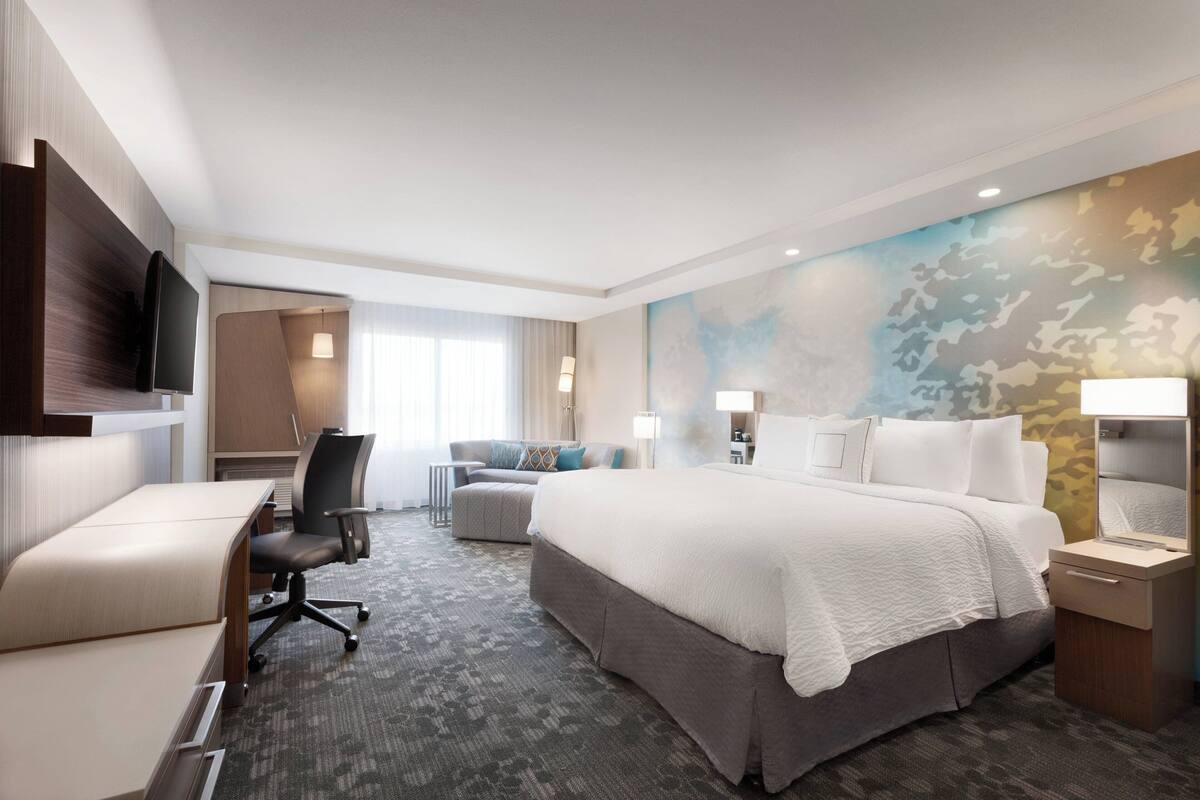 desk, laptop workspace, iron/ironing board, free cots/infant beds