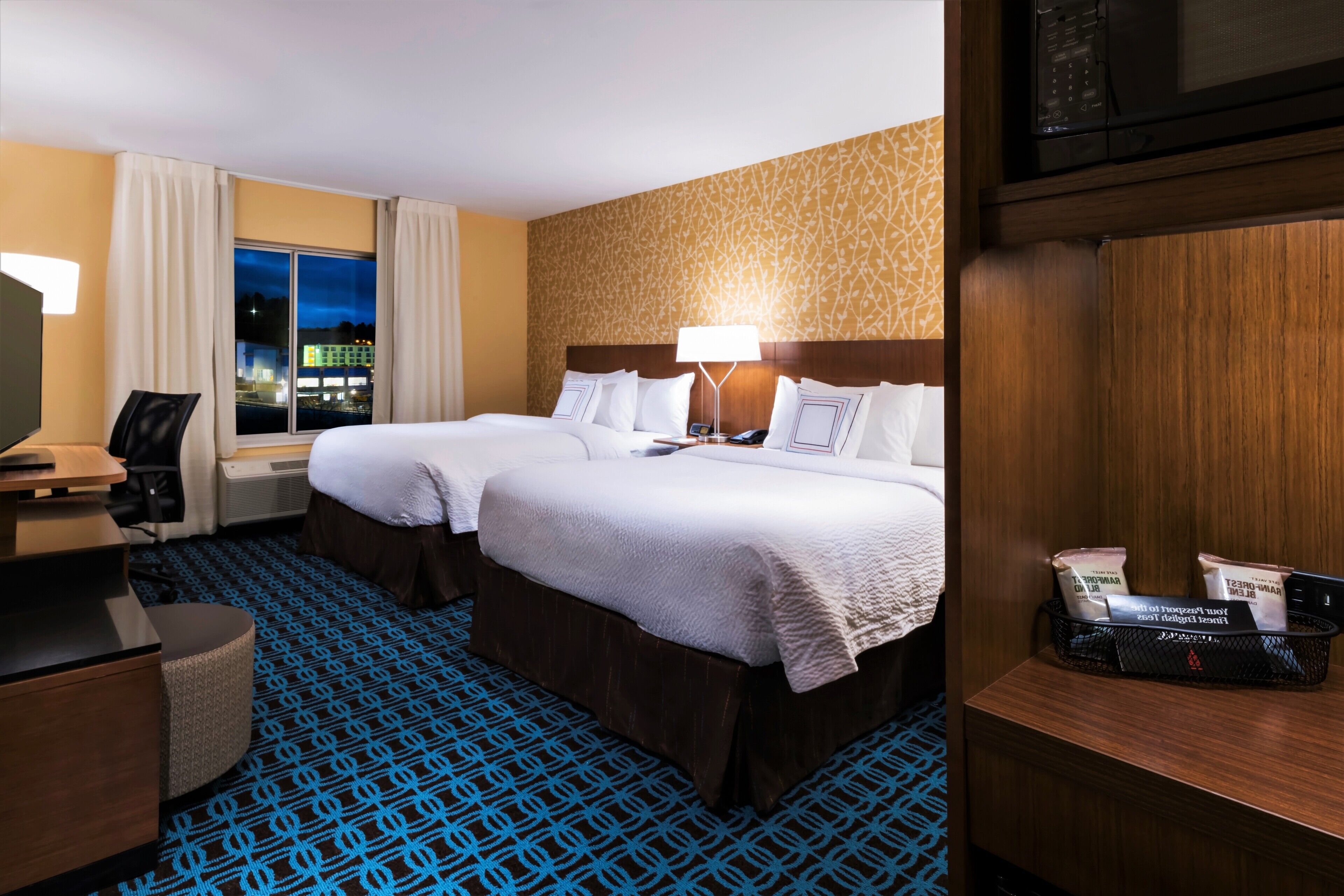 room, 2 queen beds | desk, blackout curtains, iron/ironing board, free cots/infant beds