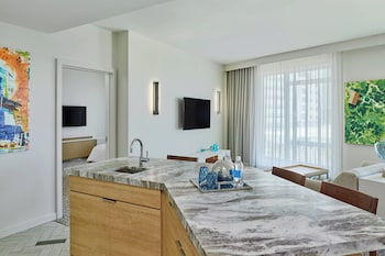 Suite, 1 Bedroom, City View | 1 bedroom, premium bedding, pillowtop beds, minibar at Art Ovation Hotel, Autograph Collection