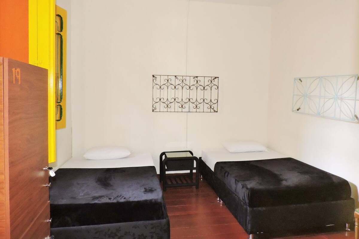 Twin Room, Shared Bathroom | Blackout drapes, WiFi (free)