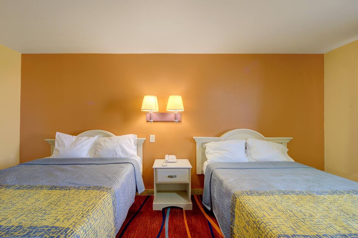 Room, 2 Queen Beds, Non Smoking | Desk, WiFi (free), bed sheets
