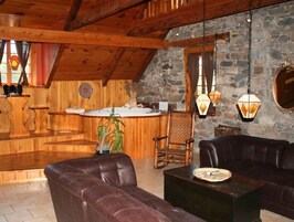 Royal Suite, 1 King Bed, Jetted Tub | Living area | Flat-screen TV