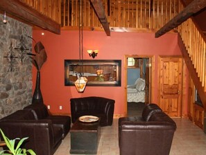 Royal Suite, 1 King Bed, Jetted Tub | Living area | Flat-screen TV