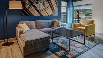 Premium bedding, desk, laptop workspace, blackout curtains