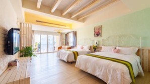 A hotel room with two beds, a wooden bench, a TV, and a large window. - Mong Shan Homestay (Hengchun)