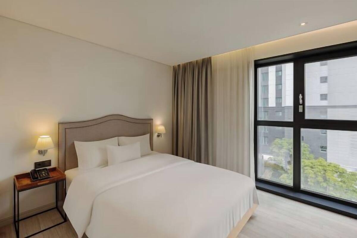 In-room safe, desk, laptop workspace, blackout curtains
