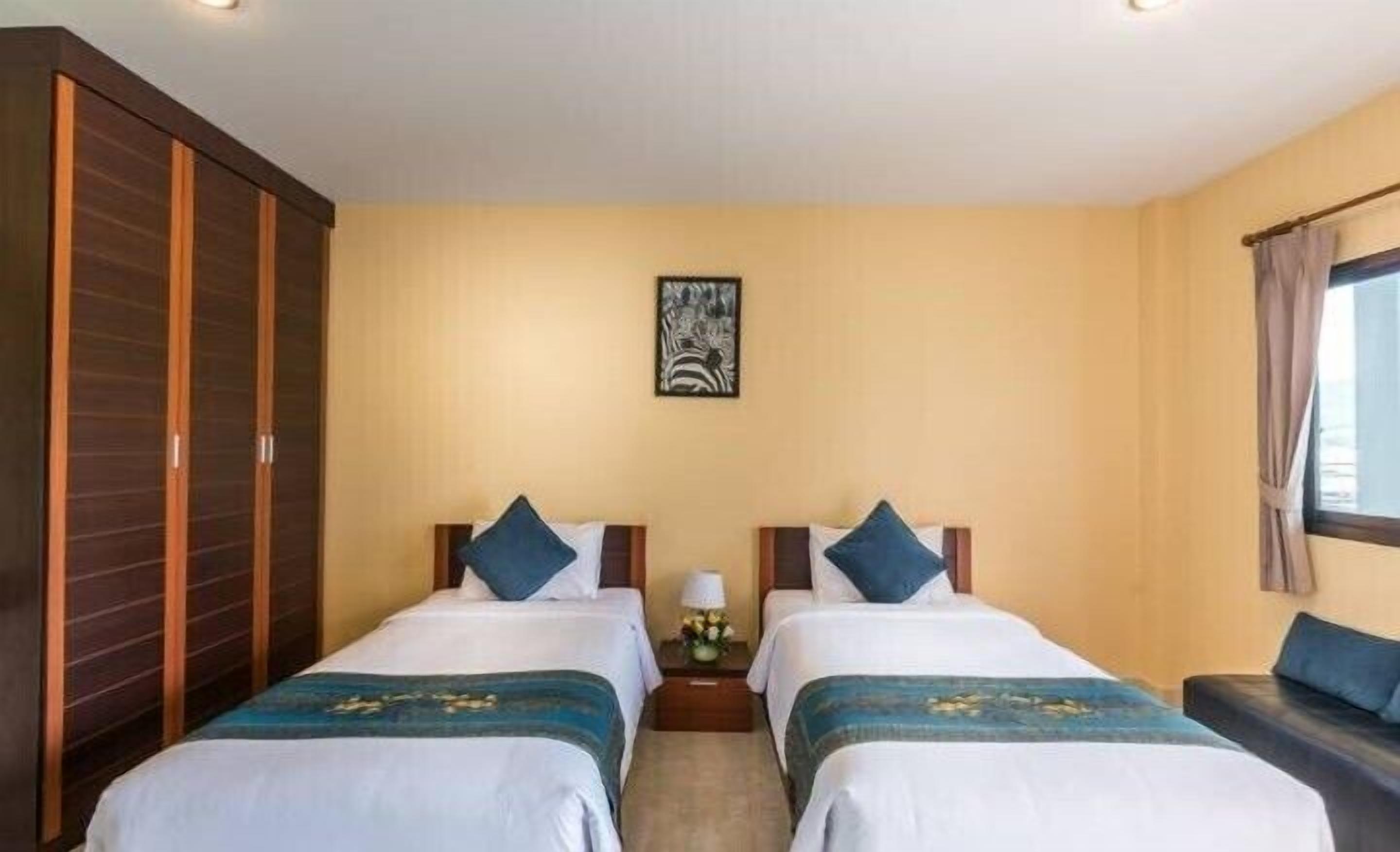 twin room | individually decorated, blackout curtains, free wifi, bed sheets