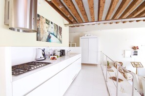 Apartment, 2 Bedrooms | Private kitchen | Full-size fridge, microwave, stovetop, dishwasher