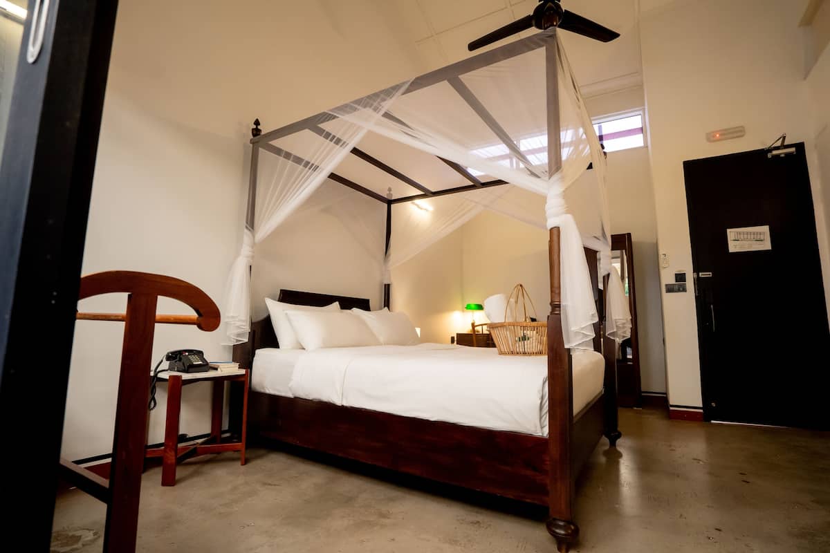Deluxe Double Room, 1 Queen Bed, Balcony | In-room safe, iron/ironing board, free WiFi, bed sheets
