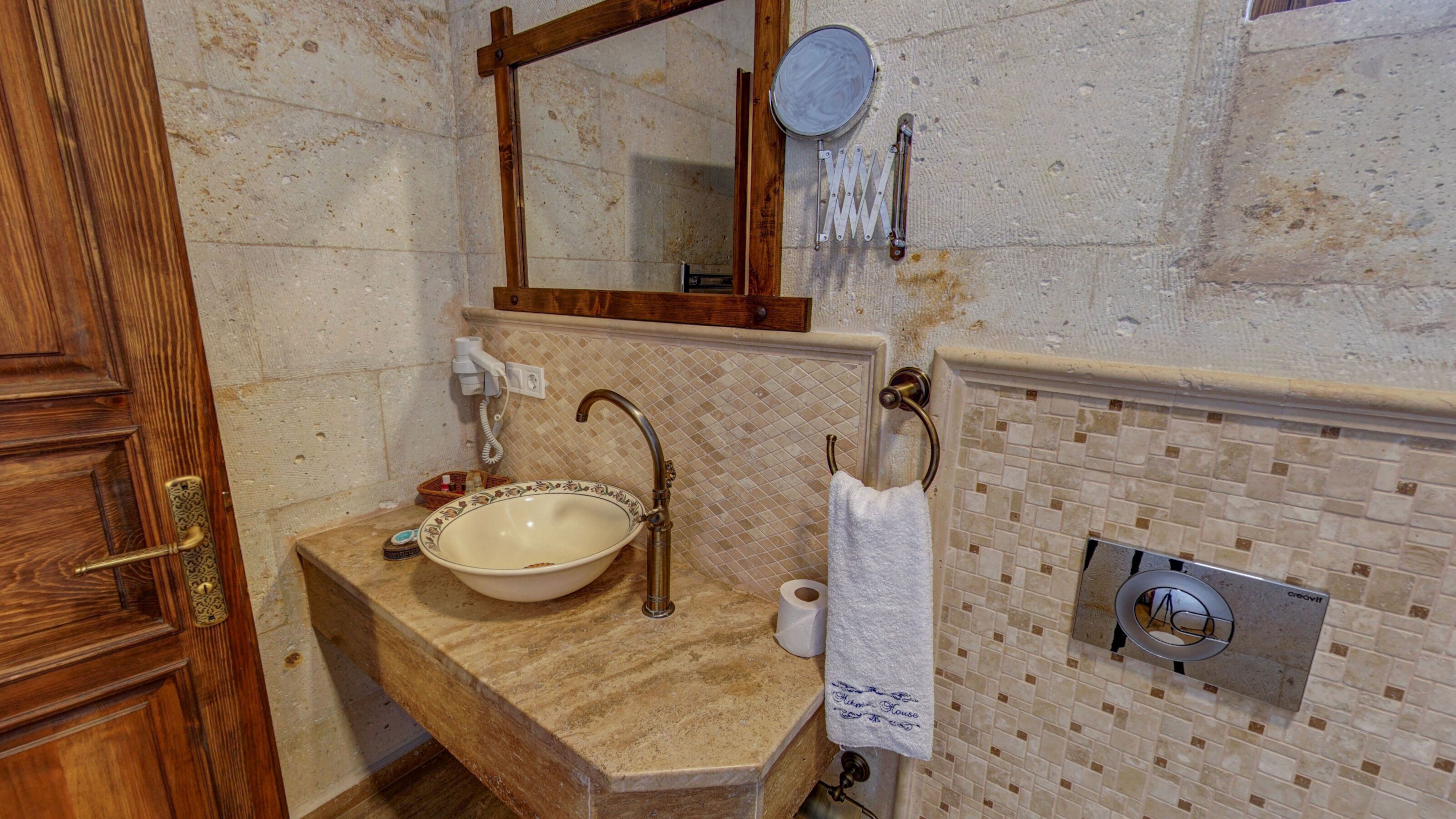 deluxe room | bathroom | shower, free toiletries, hair dryer, bathrobes