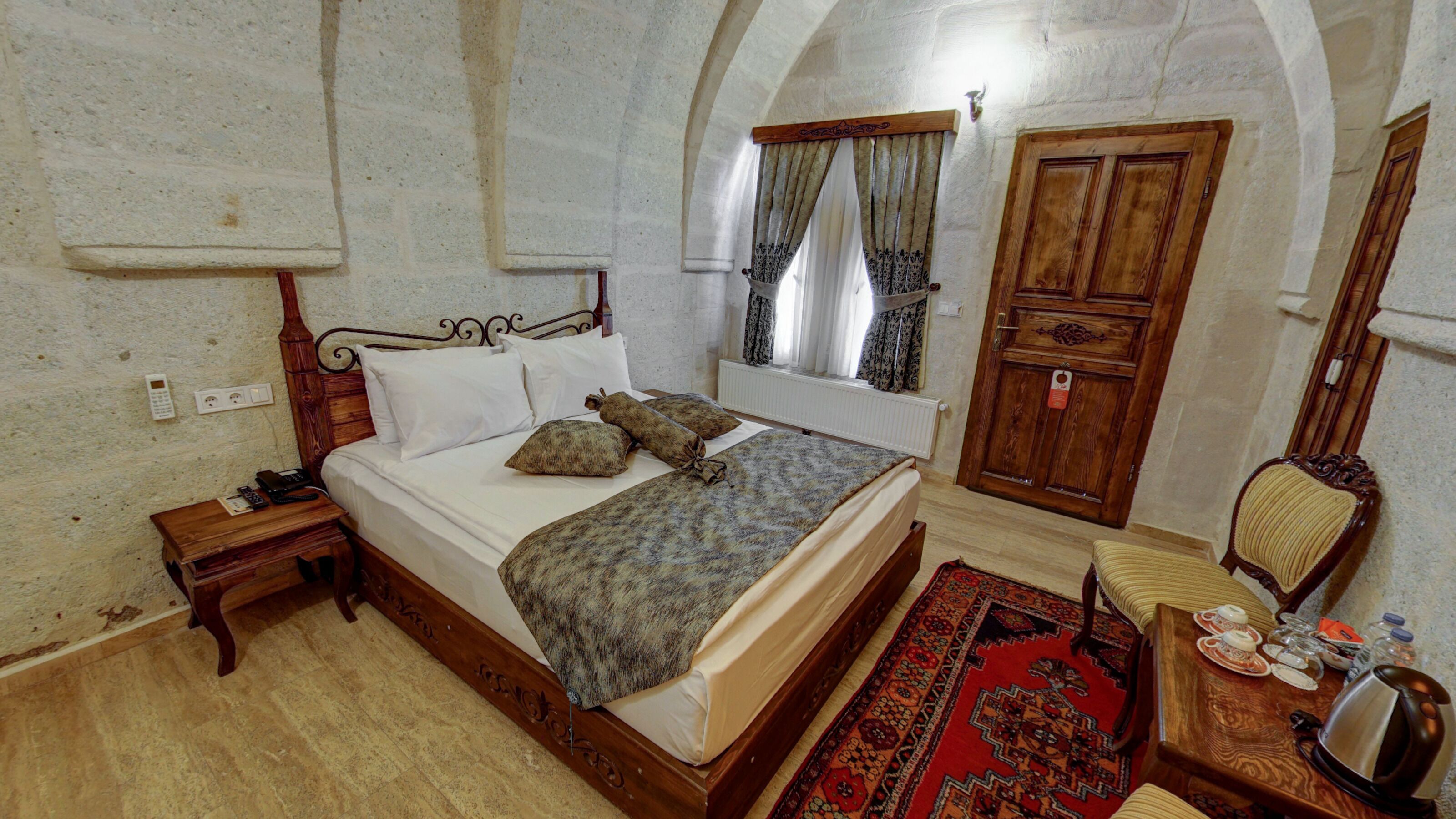 Standard Double Room | Living area | 0-inch LCD TV with satellite channels, TV