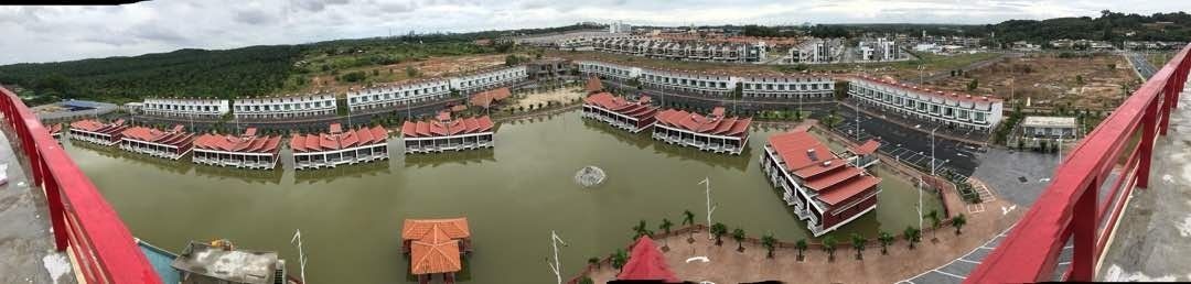 A large hotel with multiple buildings arranged around a central courtyard.