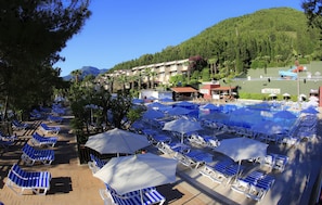 2 outdoor pools, pool umbrellas, pool loungers
