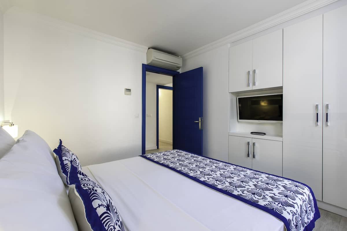 2 habitaciones, minibar y caja de seguridad en la habitación