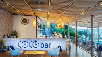 5 bars/lounges, 2 beach bars, poolside bar