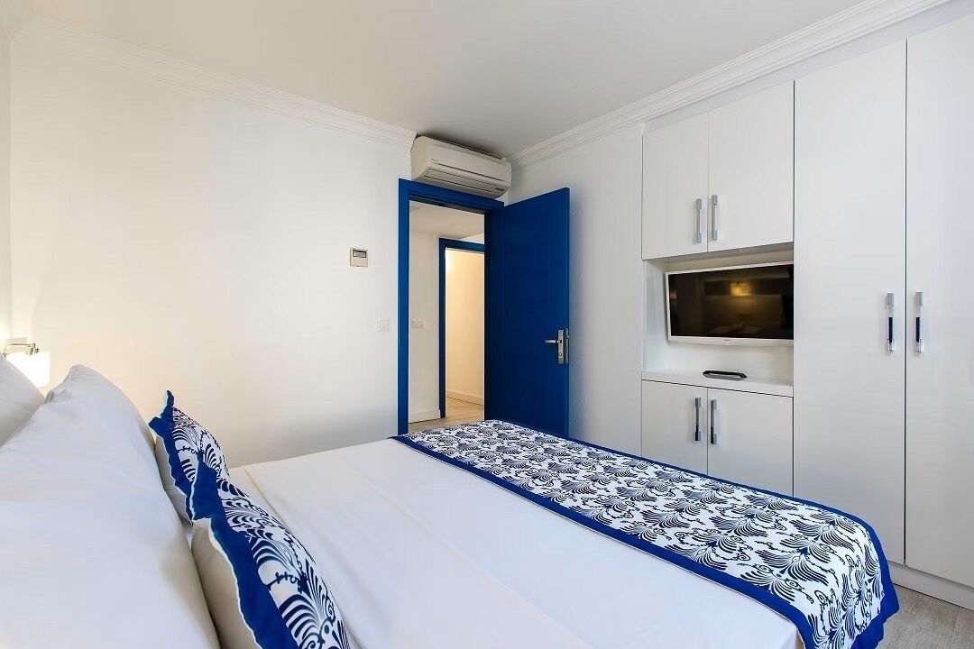 Suíte família, vista para o jardim | Frigobar, cofres nos quartos, escrivaninha, roupa de cama