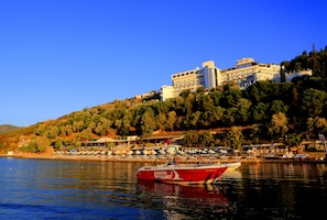 Private beach, sun-loungers, beach umbrellas, 2 beach bars