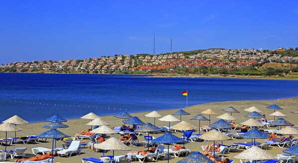 Private beach, sun-loungers, beach umbrellas, beach volleyball
