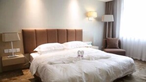 Suite – standard | Minibar, safe på rommet, skrivebord og blendingsgardiner