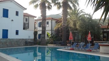 Outdoor pool, pool umbrellas, pool loungers