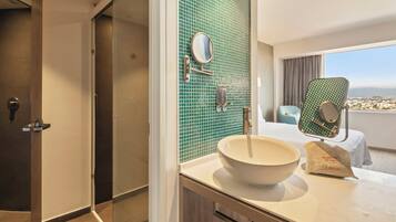 Shower, eco-friendly toiletries, hair dryer, towels
