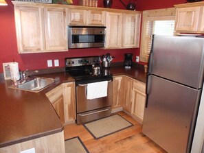 Fridge, microwave, oven, stovetop - Cabins on Maple River (Brutus)