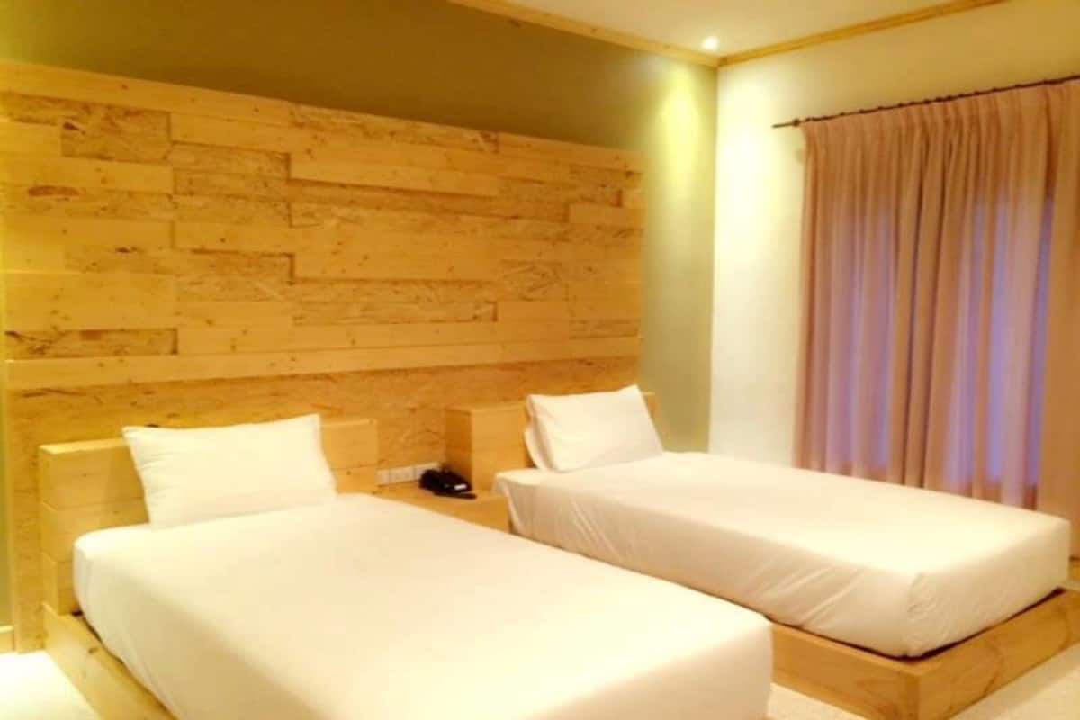 Deluxe Room, 1 Twin Bed | Una scrivania, tende oscuranti, Wi-Fi gratuito