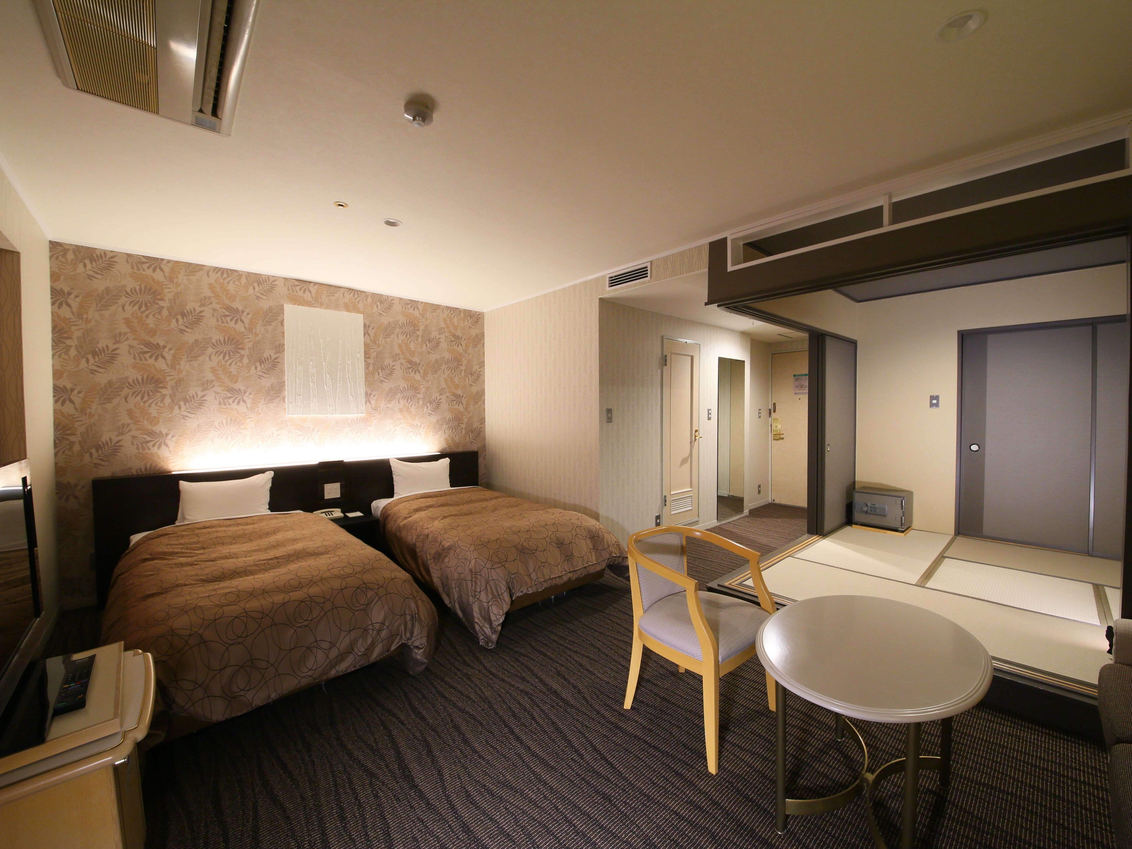 japanese/western style room for 4 people | in-room safe, desk, laptop workspace, cots/infant beds