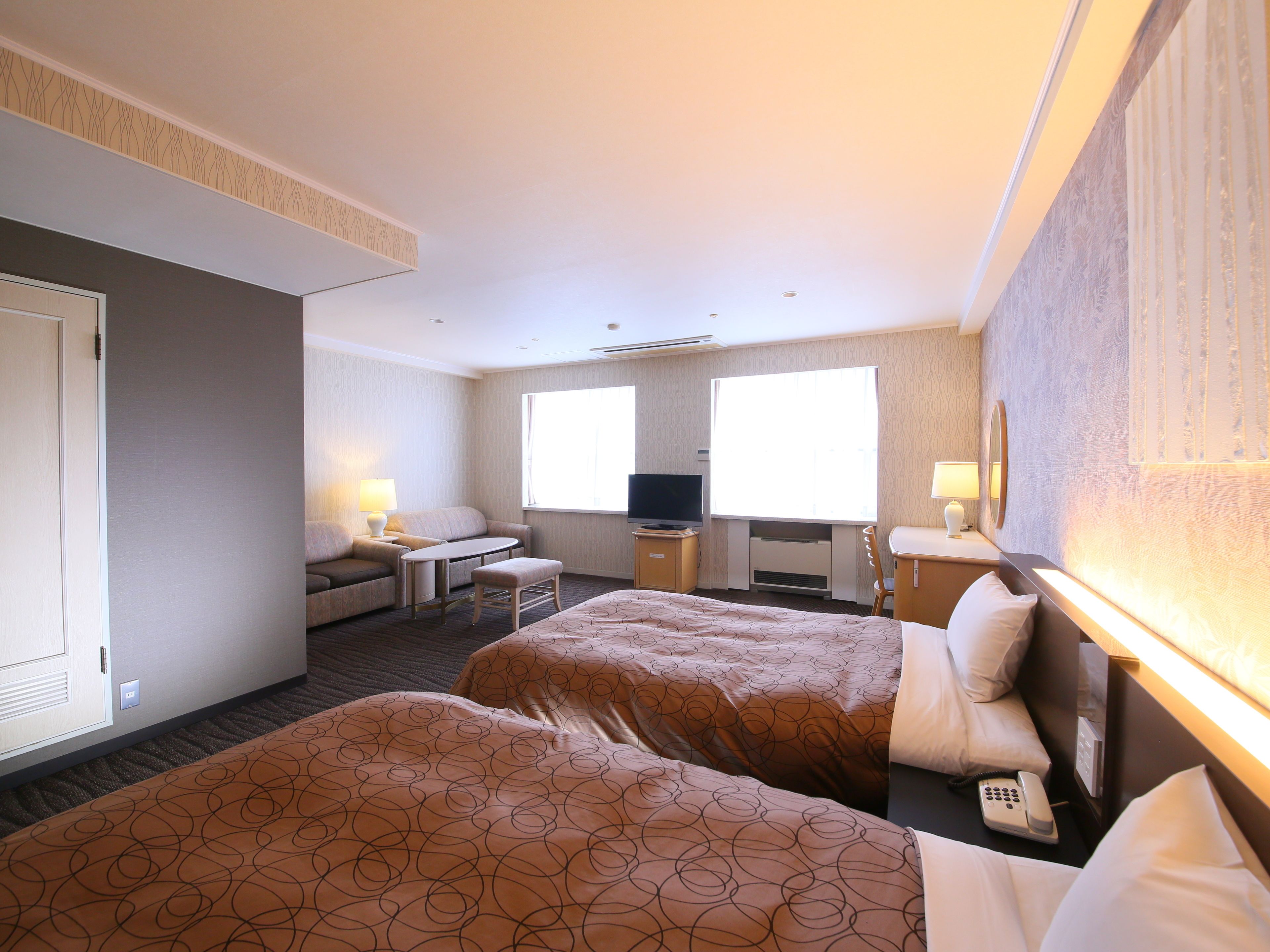 standard twin room | in-room safe, desk, laptop workspace, cots/infant beds