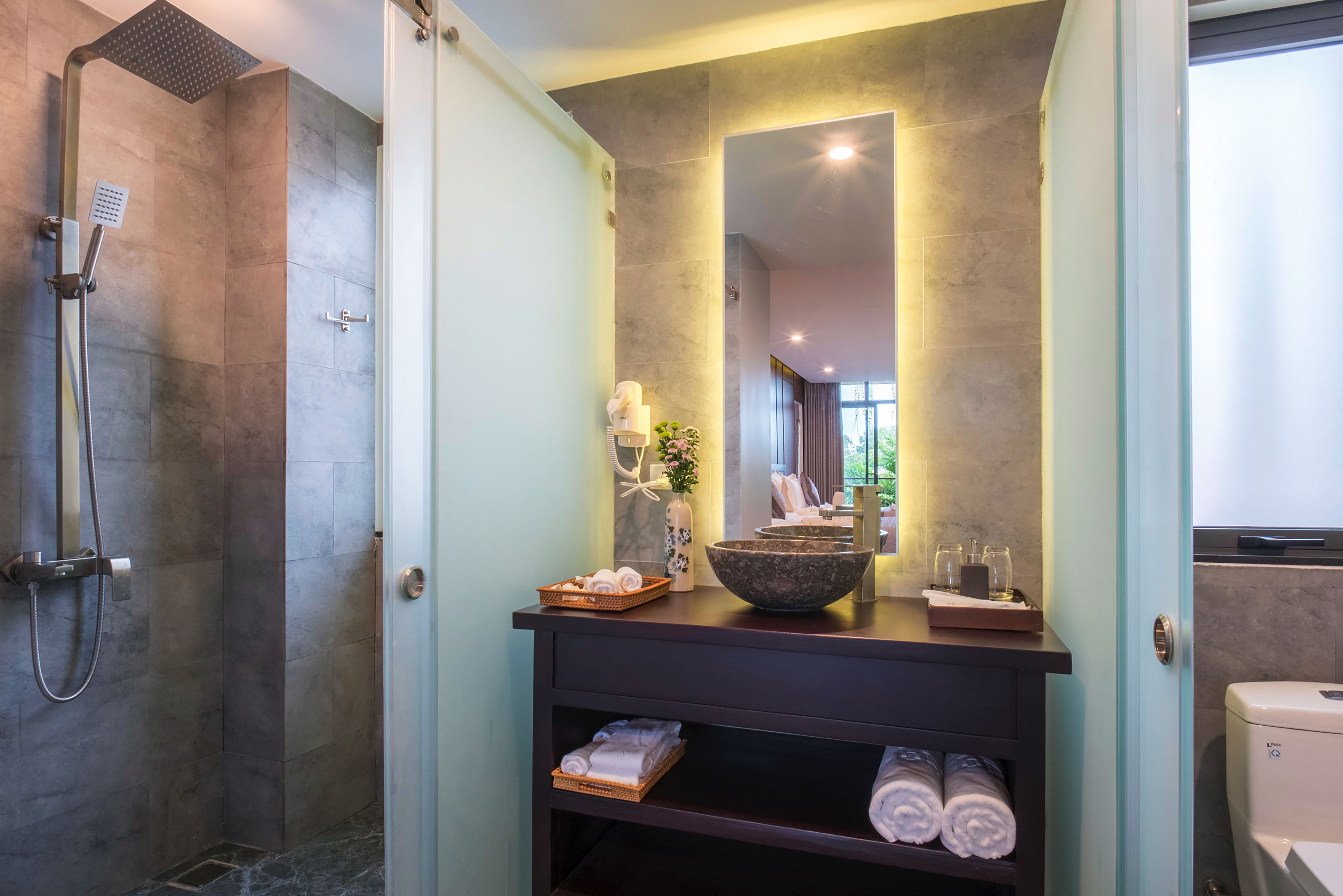 hydromassage showerhead, designer toiletries, hair dryer, bathrobes