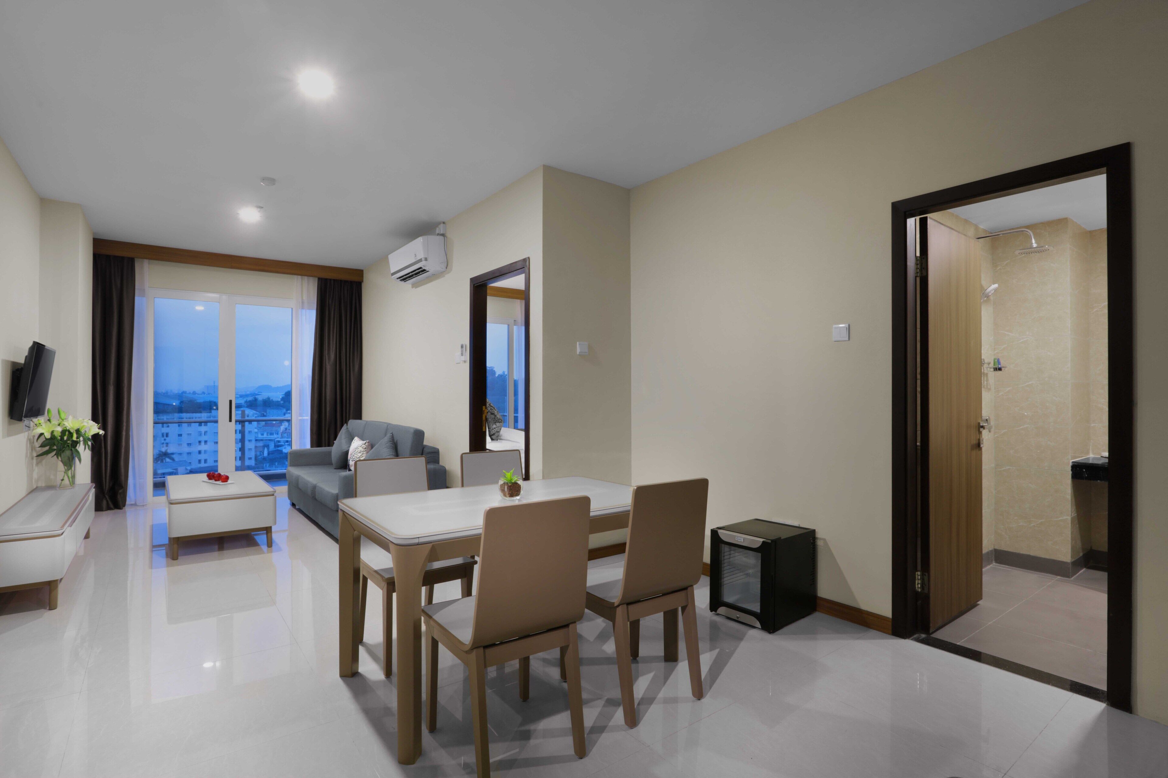 junior suite apartment (apartment building) | living area | 32-inch lcd tv with cable channels, tv