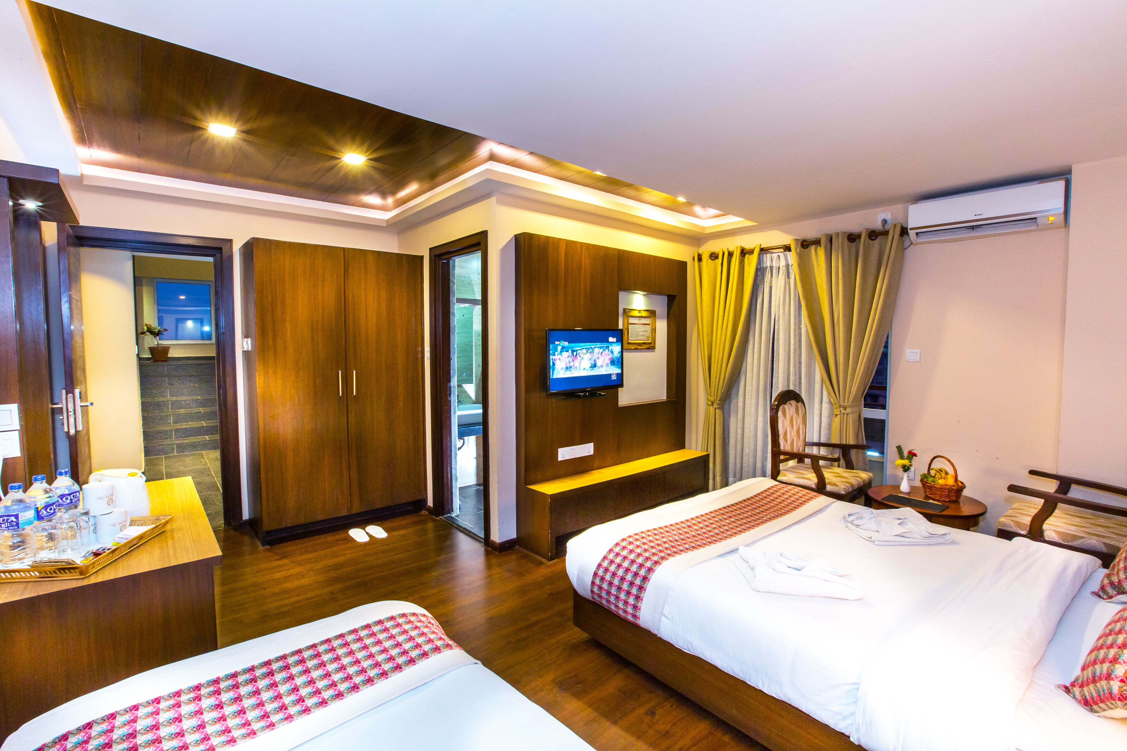 family room, balcony, city view | 1 bedroom, premium bedding, minibar, in-room safe