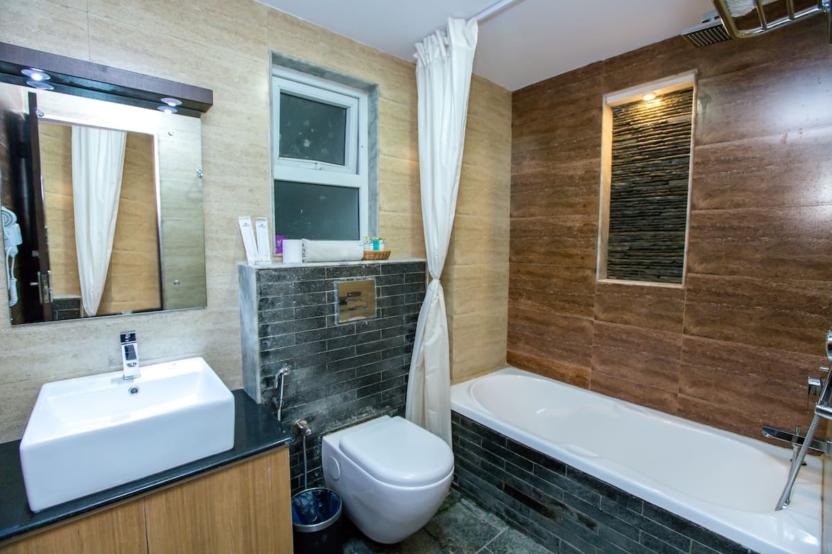 superior double room, balcony | bathroom | designer toiletries, hair dryer, slippers, towels