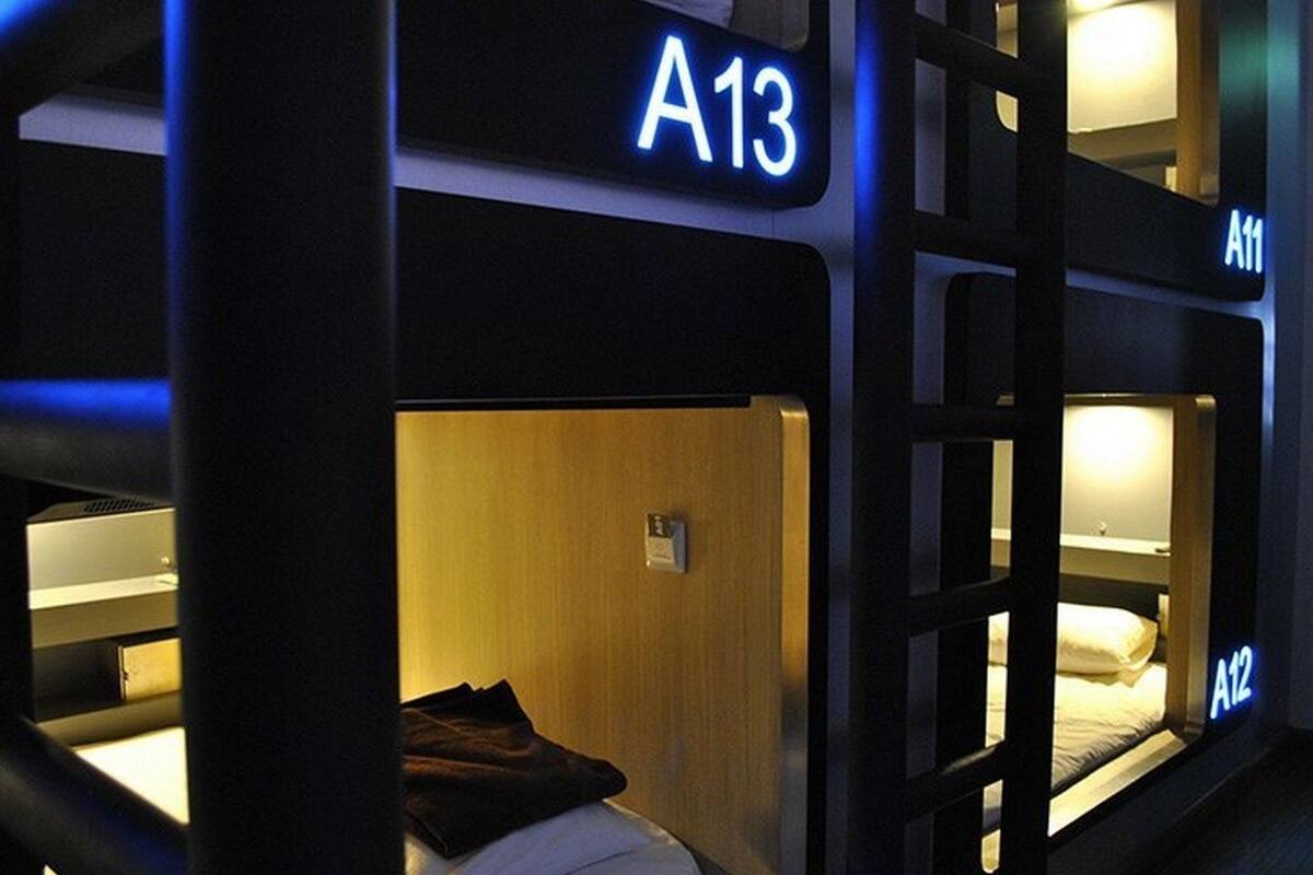 A section of a hotel with bunk beds labeled A13, A11, and A12.