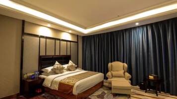 Suite empresarial | Minibar, escritorio, cortinas blackout y wifi gratis