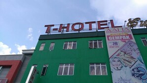 A T-HOTEL building with multiple windows and a large sign. - T Hotel Ipoh (Ipoh)