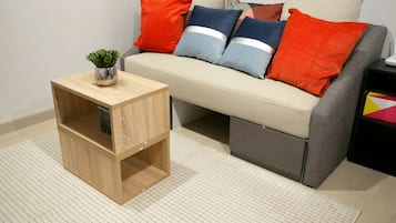 Standard Suite, 1 Queen Bed, City View | Living room | LED TV, fireplace