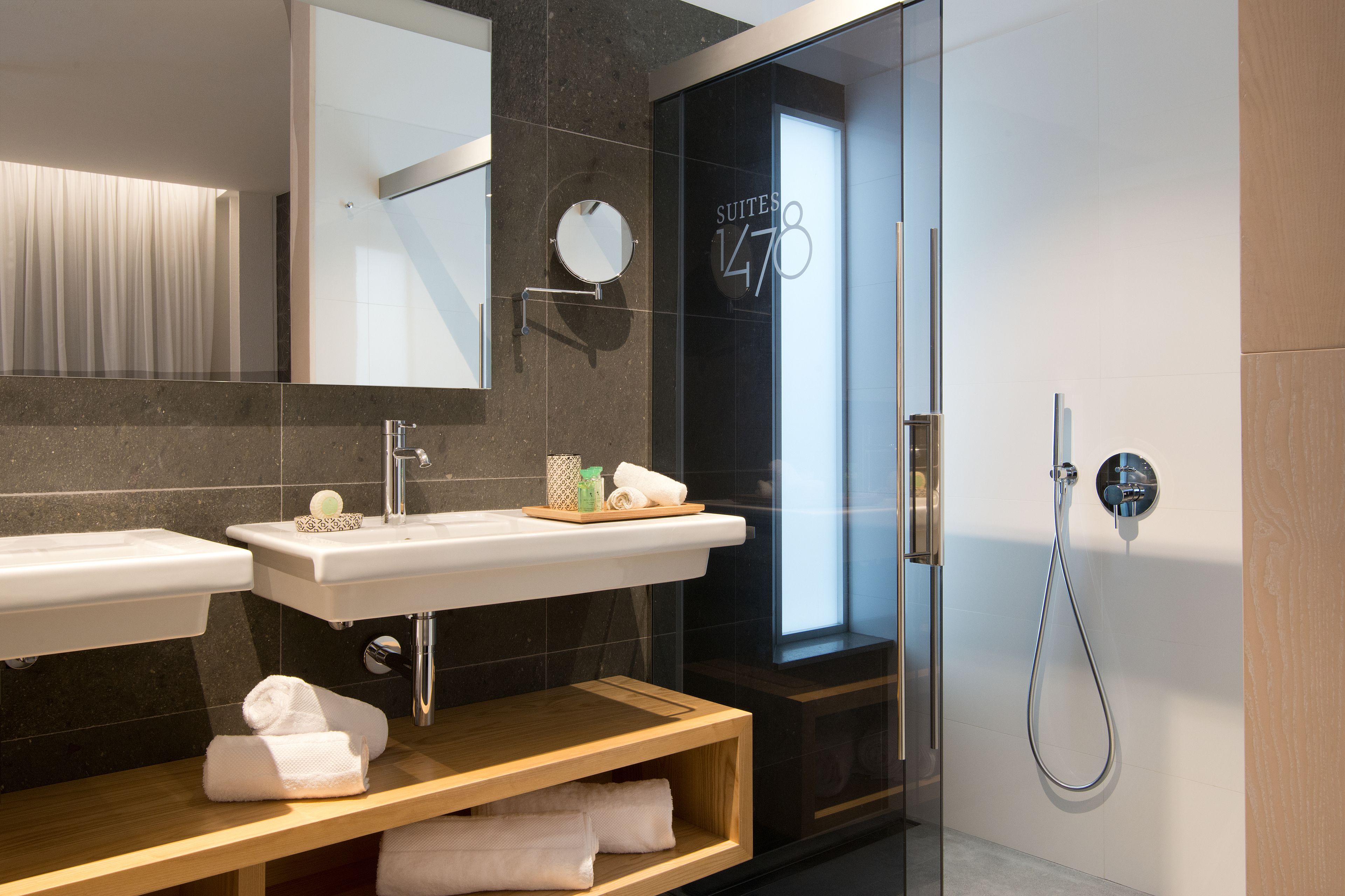 shower, rainfall showerhead, designer toiletries, hair dryer