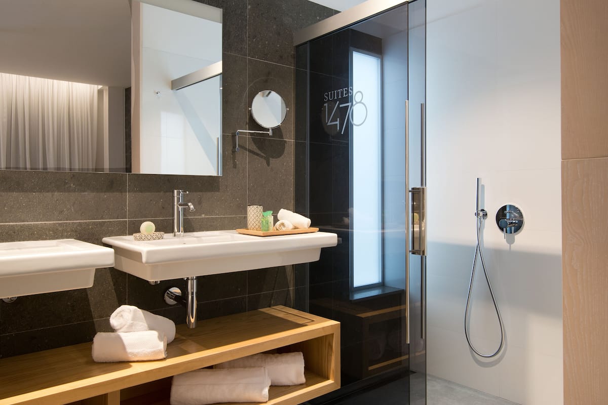 shower, rainfall showerhead, designer toiletries, hair dryer