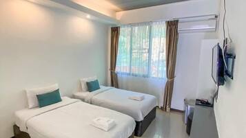 Cortinas blackout, wifi gratis y ropa de cama