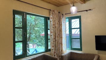 Quarto casal luxo | Área de estar