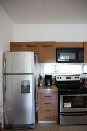 Penthouse, 2 Bedrooms | Private kitchen | Full-sized fridge, microwave, oven, stovetop