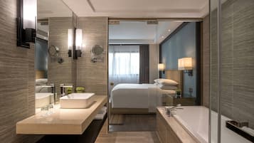 Executive Room, 1 King Bed, Balcony | Bathroom | Combined shower/tub, free toiletries, hair dryer, bathrobes